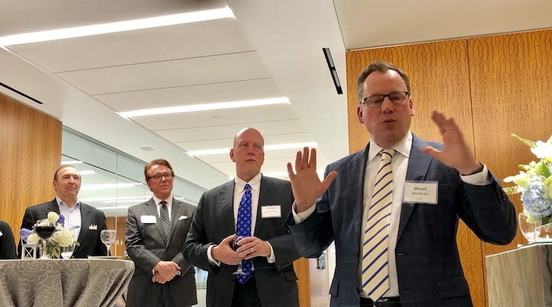 H. West Richards, right, the executive director of the American Transaction Processors Coalition, speaks in February 2018 during an event to launch preparations for the Payments 20 or P20 conference, a gathering of the top financial technology companies and regulatory agencies in the U.S., U.K., and Canada. Atlanta will play host to the second-ever P20 conference on Wednesday. J. SCOTT TRUBEY/STRUBEY@AJC.COM