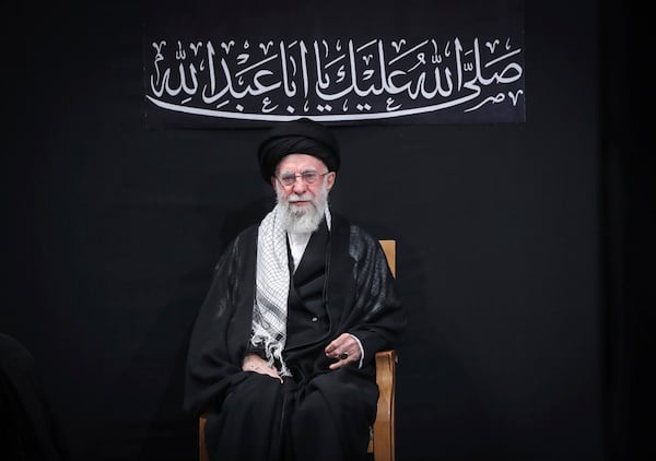 In this photo provided by the Office of the Iranian Supreme Leader, Supreme Leader Ayatollah Ali Khamenei attends a mourning ceremony commemorating the death anniversary of the Prophet Muhammad's grandson, Hussein, in Tehran, Iran, on Saturday, July 6, 2025. (Office of the Iranian Supreme Leader via AP)