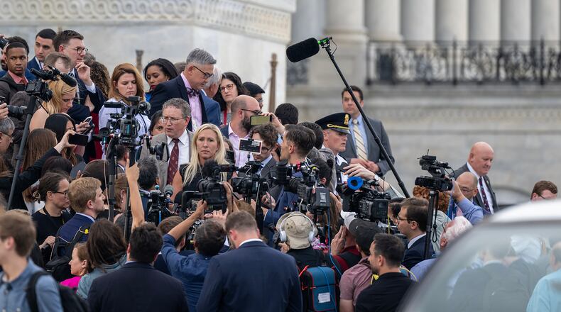 U.S. Rep. Marjorie Taylor Greene, R-Rome, speaks to reporters after attempting to oust House Speaker Mike Johnson, another Republican. Democrats linked arms with most Republicans to fend off Greene's attempt. (Kenny Holston/The New York Times)