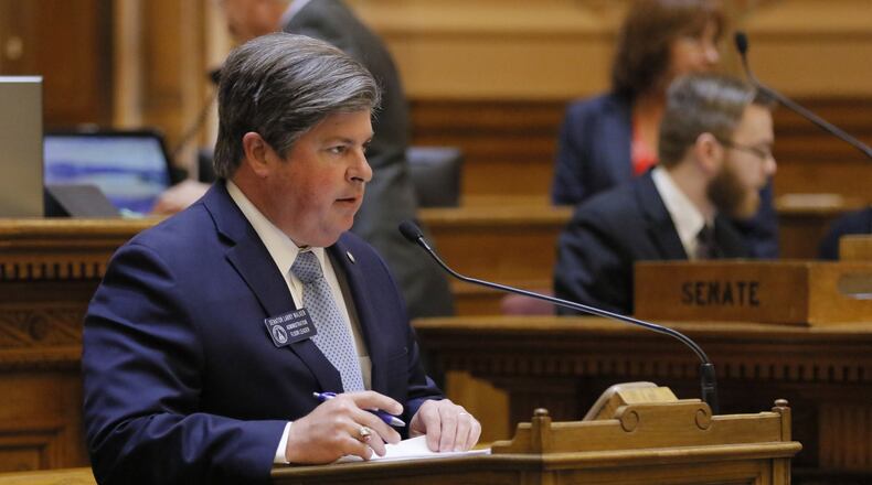 State Sen. Larry Walker III, R-Perry, presents a bill in February which would ban “upskirting” and make it illegal to surreptitiously take a video of a person’s private parts in a public place in Georgia. The state Senate unanimously backed the measure then and separately voted last week to include the ban in another piece of legislation, sending it to Gov. Nathan Deal for his signature. BOB ANDRES /BANDRES@AJC.COM