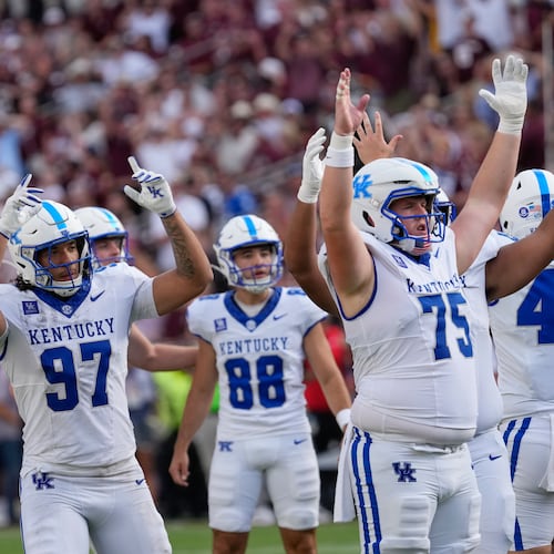 Kentucky players celebrate a field goal by kicker Adam Zouagui (88) during the second half of an NCAA college football game against Texas A&M Saturday, Sept. 19, 2026, in College Station, Texas. (AP Photo/David J. Phillip)
