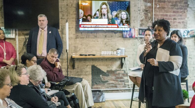 Stacey Abrams, along with Democratic Party of Georgia Chairwoman Nikema Williams and other guests, attends a roundtable discussion on voter suppression in the state. Bob Andres / robert.andres@ajc.com