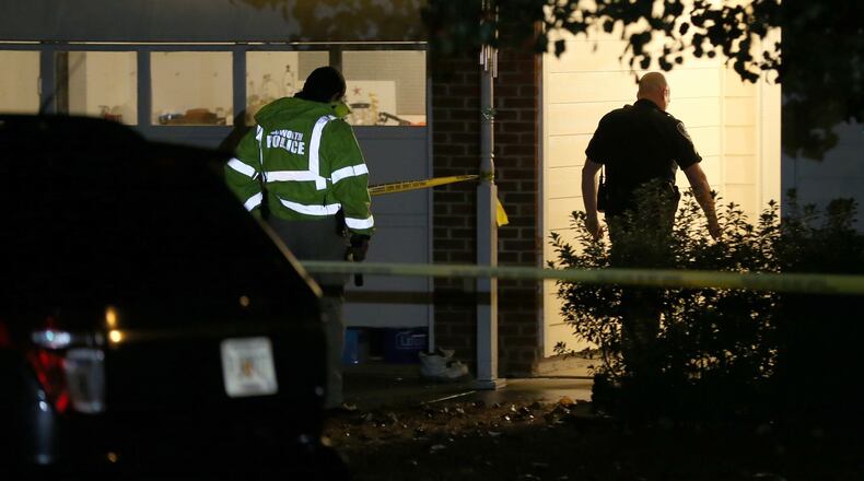 Acworth police investigate at a home where a 2-year-old boy shot and killed himself with a handgun Tuesday evening, Oct. 27, 2015. (Ben Gray / bgray@ajc.com)