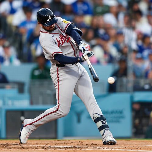 Atlanta Braves' Austin Riley hits an RBI single during the second inning of a baseball game against the Los Angeles Dodgers, Friday, May 8, 2026, in Los Angeles. (AP Photo/Jessie Alcheh)