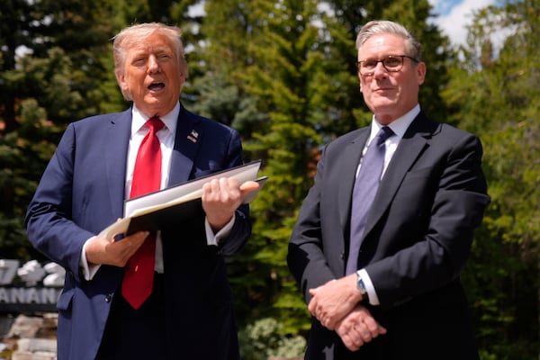 President Donald Trump meets with Britain's Prime Minister Keir Starmer on the sidelines of the G7 Summit, Monday, June 16, 2025, in Kananaskis, Canada. (AP Photo/Mark Schiefelbein)