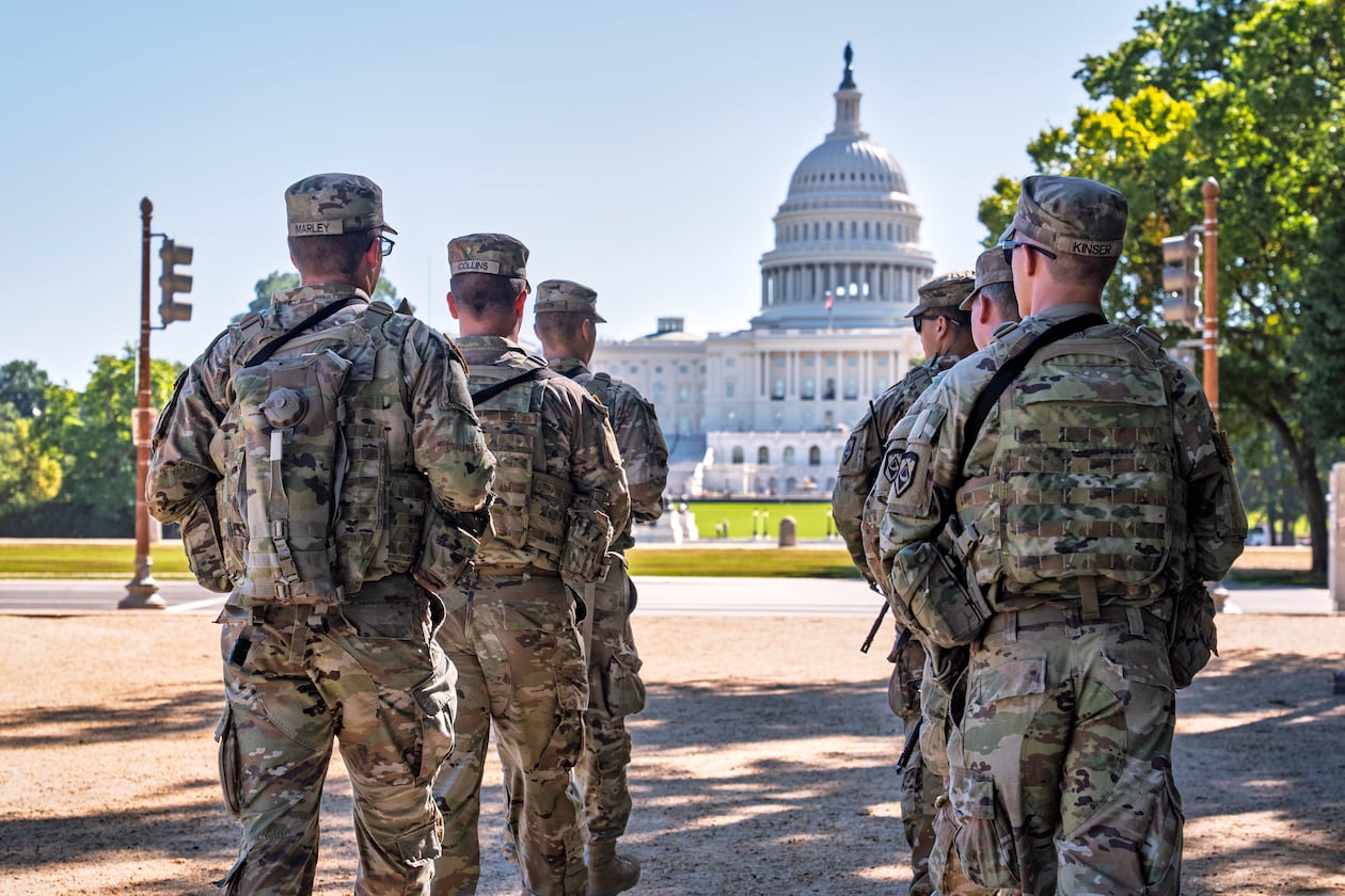 Armed National Guard soldiers from West Virginia patrol the Mall near the Capitol in Washington, as part of President Donald Trump's order to impose federal law enforcement in the District of Columbia, Tuesday, Aug. 26, 2025. (J. Scott Applewhite/AP)