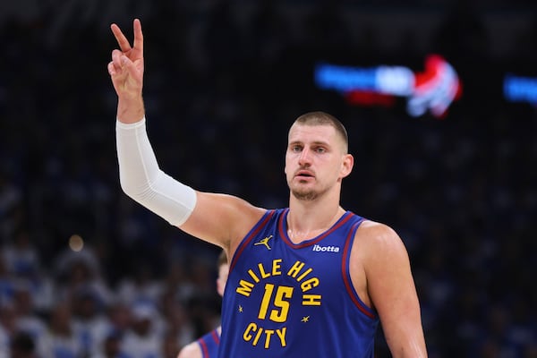 Denver Nuggets' Nikola Jokic gestures in the first half of Game 5 of an NBA basketball second-round playoff series against the Oklahoma City Thunder Tuesday, May 13, 2025, in Oklahoma City. (AP Photo/Nate Billings)