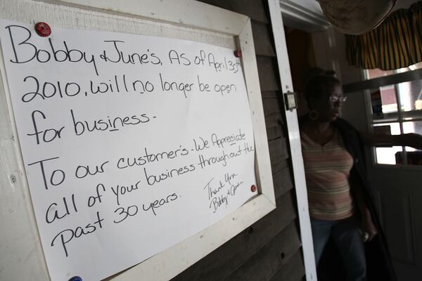 A sign posted at the entrance to the restaurant in 2010 told customers about the closure. / AJC file photo