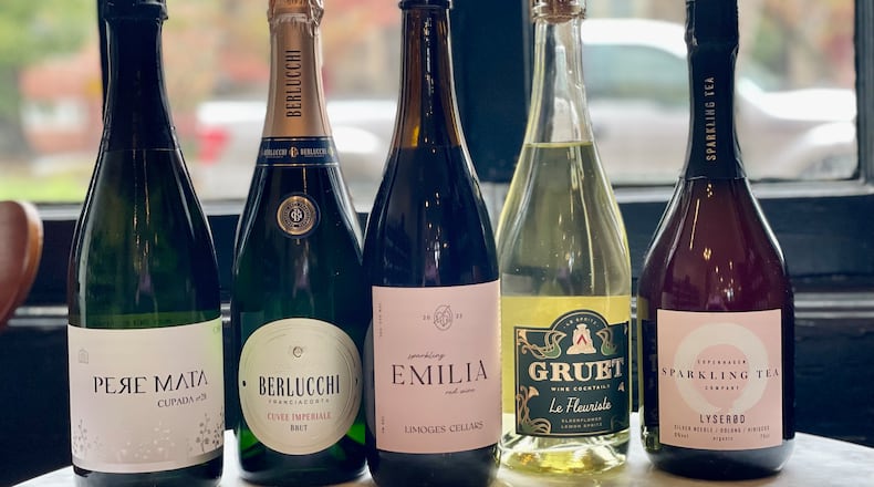 Here are several fizzy wines that can make your holidays more festive. (Krista Slater for The Atlanta Journal-Constitution)