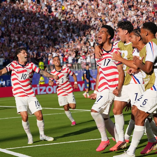 United States' Malik Tillman (17) celebrates with teammates after scoring on a free kick during the World Cup round of 32 soccer match between the United States and Bosnia in Santa Clara, Calif., near San Francisco, Wednesday, July 1, 2026. (AP Photo/Martin Meissner)