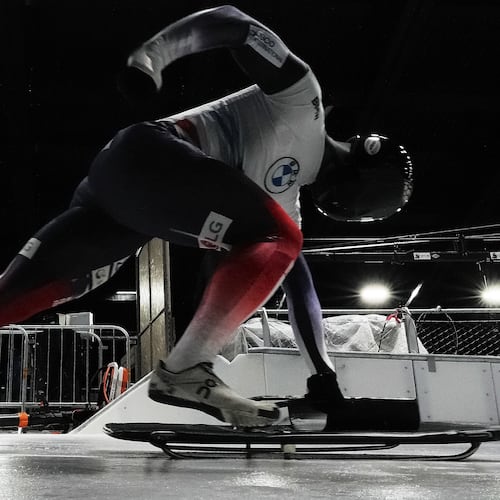 South Korea's Jung Seunggi takes the start at a training session ahead of a three day skeleton and bobsled World Cup stage and Olympic test event in Cortina D'Ampezzo, Italy, Wednesday, Nov. 19, 2025. (AP Photo/Andrew Medichini)