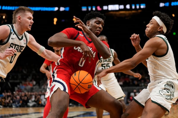Mississippi forward Malik Dia (0) loses the ball against Michigan State during the first half in the Sweet 16 of the NCAA college basketball tournament, Friday, March 28, 2025, in Atlanta. (AP Photo/George Walker IV)