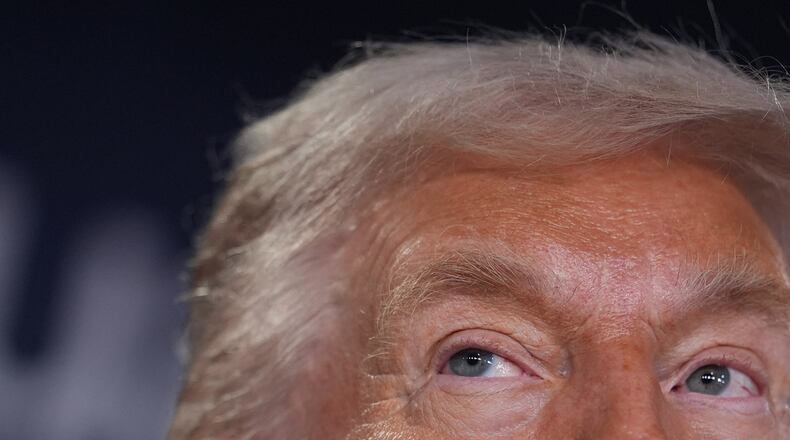 President Donald Trump speaks during a meeting of Global Business Leaders at the Annual Meeting of the World Economic Forum in Davos, Switzerland, Wednesday, Jan. 21, 2026. (AP Photo/Evan Vucci)