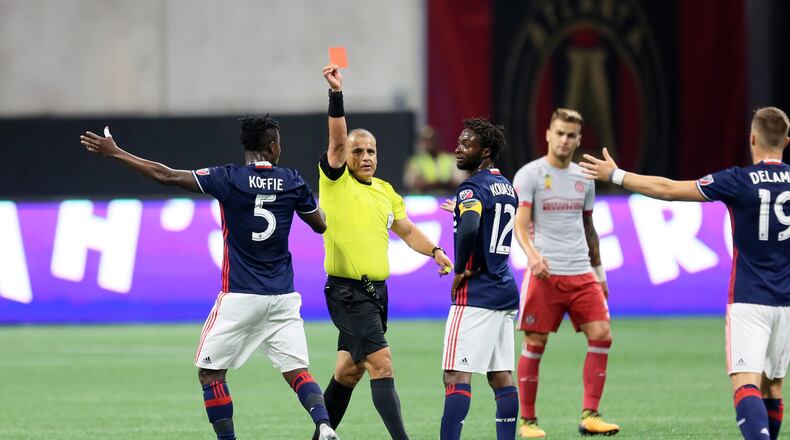 September 13, 2017 Atlanta. New England minefielder Xavier Kouassi (12). got rejected from the game for a rough play to a Atlanta United player.