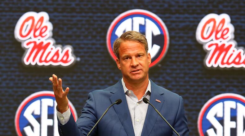 Ole Miss coach Lane Kiffin takes questions during his news conference Monday at SEC Media Days at the College Football Hall of Fame in Atlanta. (Curtis Compton / Curtis Compton@ajc.com)