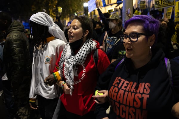 Protestors rally against Immigration and Customs Enforcement in front of the Capitol in Atlanta on Thursday, Jan. 8, 2026, the day after Renee Good was shot and killed by an ICE agent in Minneapolis. (Arvin Temkar/AJC)