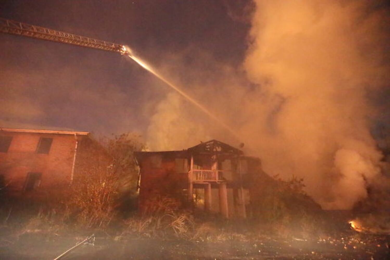 Firefighters contend with strong winds, cold weather