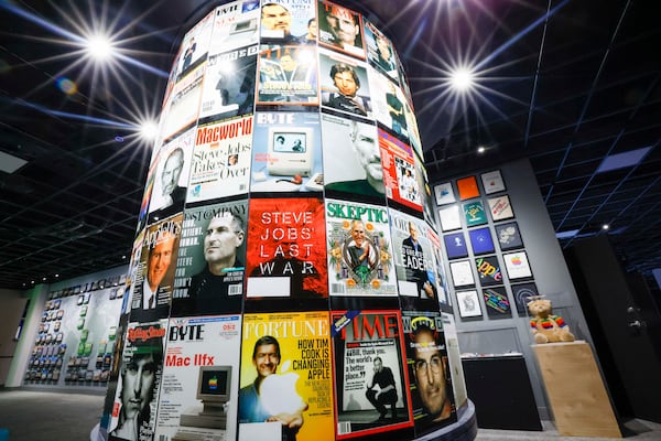 A collection of magazine covers featuring Apple products or personnel is part of the "50 Years of Innovation from Apple" exhibit.  (Miguel Martinez/AJC)