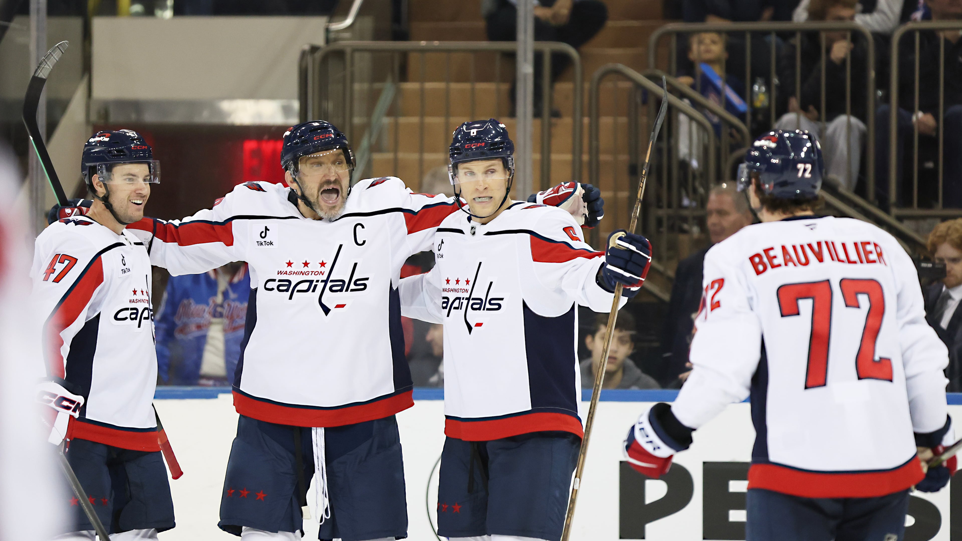 Washington Capitals players react after a goal by Anthony Beauvillier (72) during the second period of an NHL hockey game against the New York Rangers, Sunday, Oct. 12, 2025, in New York. (AP Photo/Heather Khalifa)