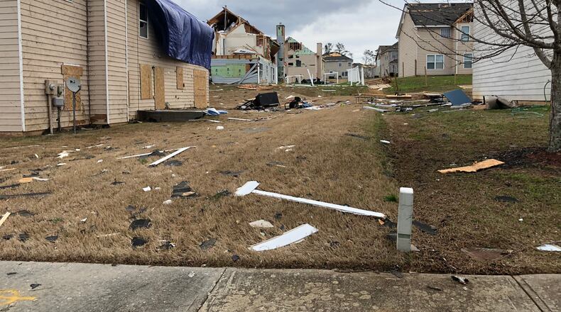 A tornado that struck the Chestnut Ridge subdivision in Fairburn on Monday cut a path of destruction through many homes.