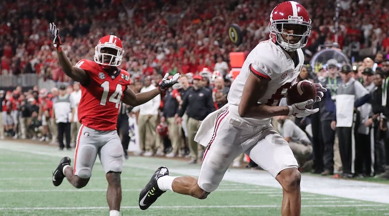 Alabama wide receiver Devonta Smith catches the game-winning touchdown pass past Georgia defensive back Malkom Parrish for a 26-23 victory during overtime in the College Football Playoff Championship game Monday, January 8, 2018, in Atlanta. Curtis Compton/ccompton@ajc.com