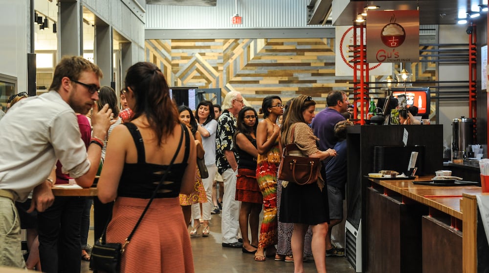 Gu's Dumpling crowd line up inside Krog Street Market on Aug. 7, 2015. (Beckysteinphotography.com)