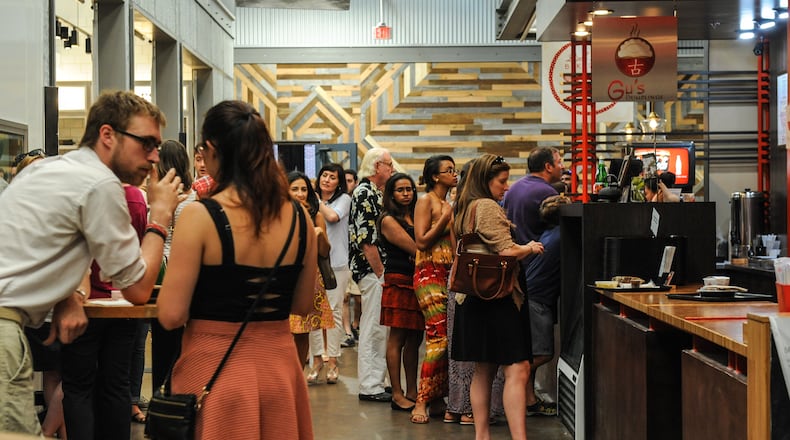 Diners line up for Gu's Dumpling at Krog Street Market. (Beckysteinphotography.com)