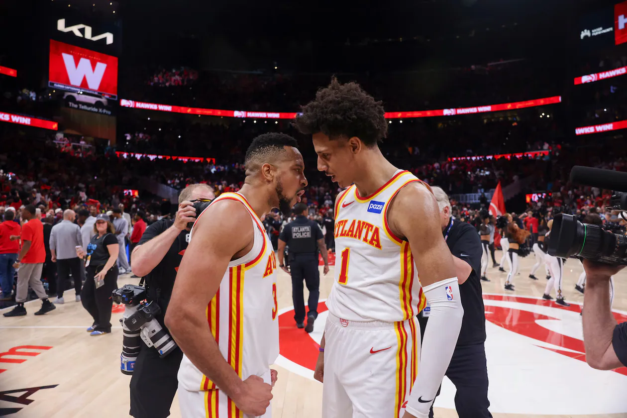 Atlanta Hawks guard CJ McCollum (3) and Atlanta Hawks forward Jalen Johnson (1) celebrate their 109-108 win against the New York Knicks in game 3 of the NBA first round playoffs at State Farm Arena, Thursday, April 23, 2026, in Atlanta. (Jason Getz/AJC)