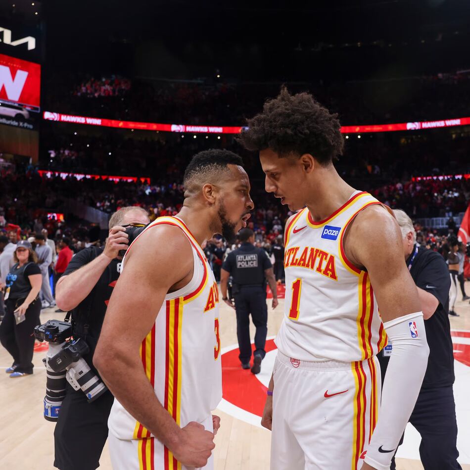 Atlanta Hawks guard CJ McCollum (3) and Atlanta Hawks forward Jalen Johnson (1) celebrate their 109-108 win against the New York Knicks in game 3 of the NBA first round playoffs at State Farm Arena, Thursday, April 23, 2026, in Atlanta. (Jason Getz/AJC)
