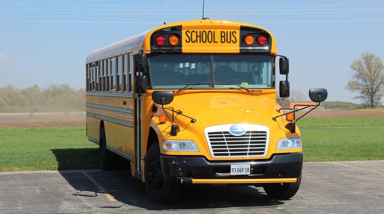 A school bus driver in Arkansas was killed when he was trapped under the vehicle after it slipped out of gear.