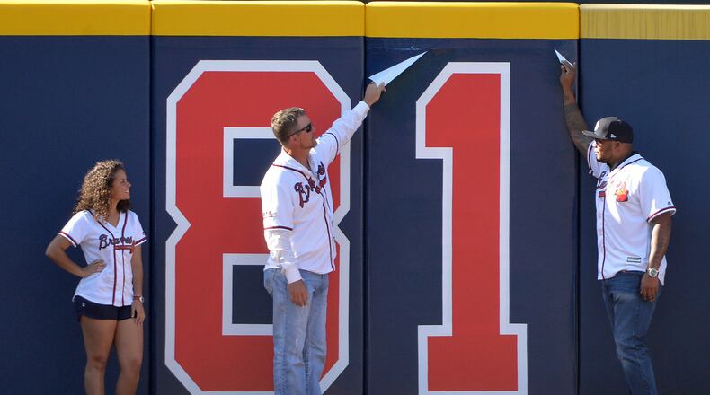 April 4, 2016 Atlanta - 1997 Braves team members Chipper Jones and Andruw Jones kick off the home game countdown by removing “81†in the middle of the fifth inning during the home opener at Turner Field on Monday, April 4, 2016. HYOSUB SHIN / HSHIN@AJC.COM