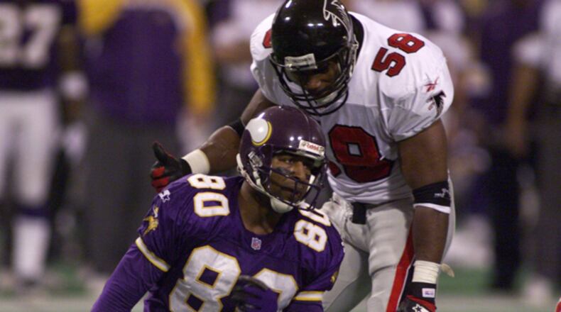 The first conference title game to feature two "dome" teams was marked as much for the back-and-forth play in regulation - as seen by Falcons' Jessie Tuggle exchanging words with Minnesota's Chris Carter - as its dramatic ending. With 13 minutes left in the fourth quarter, the Falcons trailed the Vikings 27-17. The Falcons narrowed the score with a Morten Andersen field goal and caught a huge break when Minnesota's kicker Gary Anderson missed a 38-yard attempt - his only miss of the season. With 2:07 left in the game, the Falcons drove down the field and tied the game on a Terance Mathis 16-yard touchdown grab with 49 seconds left, setting up overtime ...