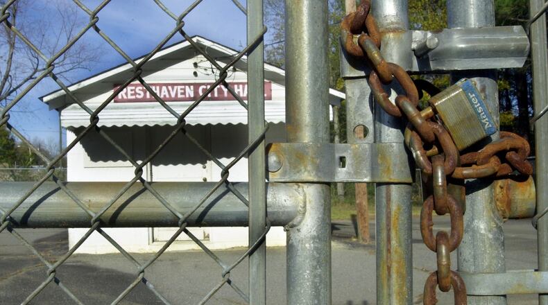 The town tried to dissolve itself in 2001, and for a short time succeeded, when two residents sued, claiming that the city didn't provide enough services. But a counter lawsuit by a resident forced the city to be reinstated in 2002, when this photo of the city hall was taken. “I guess we did it the wrong way,” says Kenneth Waycaster, Rest Haven's mayor since 1988, and proponent of the city's dissolution. (LAURA NOEL / AJC file)