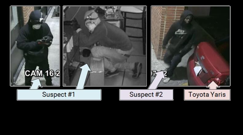 Gwinnett County police are searching for two men who stole a safe from I Luv Pho in Norcross.