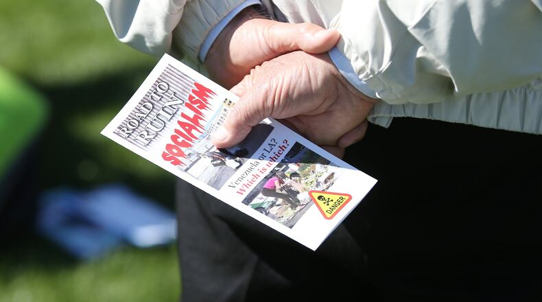 Republican candidates in Georgia and across the nation are seizing on the positions of liberal lawmakers such as U.S. Rep. Alexandria Ocasio-Cortez and trying to cast their Democratic opponents in the upcoming elections, even the moderates, as socialists. EMILY HANEY / emily.haney@ajc.com