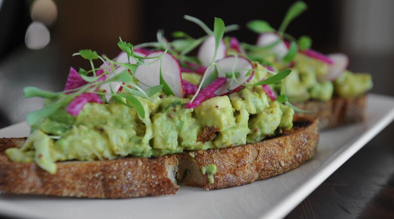 Crab and Avocado toast with lemon dijon dressing and shaved spring radishes at Murphy's.(Beckysteinphotography.com)