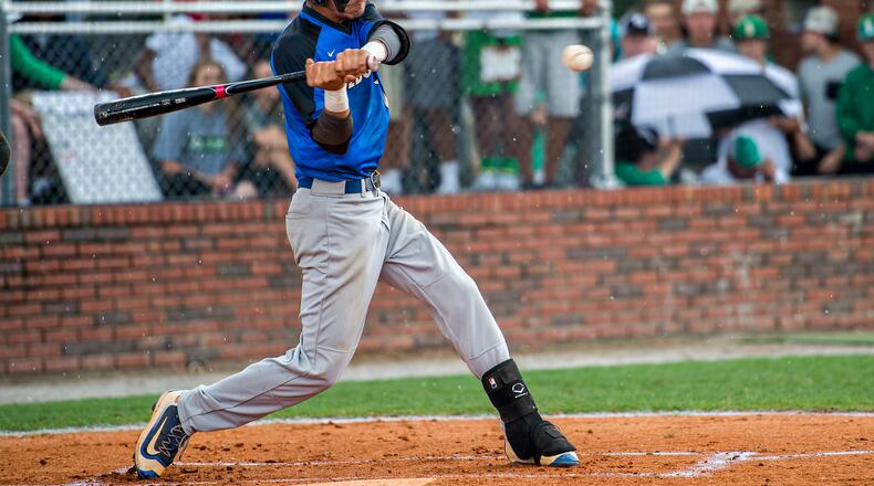 May 21, 2016 Buford - Locust Grove's Odlanier Rodriguez connects with the ball during their game against Buford during the GHSA Class AAAA Championship Baseball Tournament in Buford on Saturday, May 21, 2016. JONATHAN PHILLIPS / SPECIAL