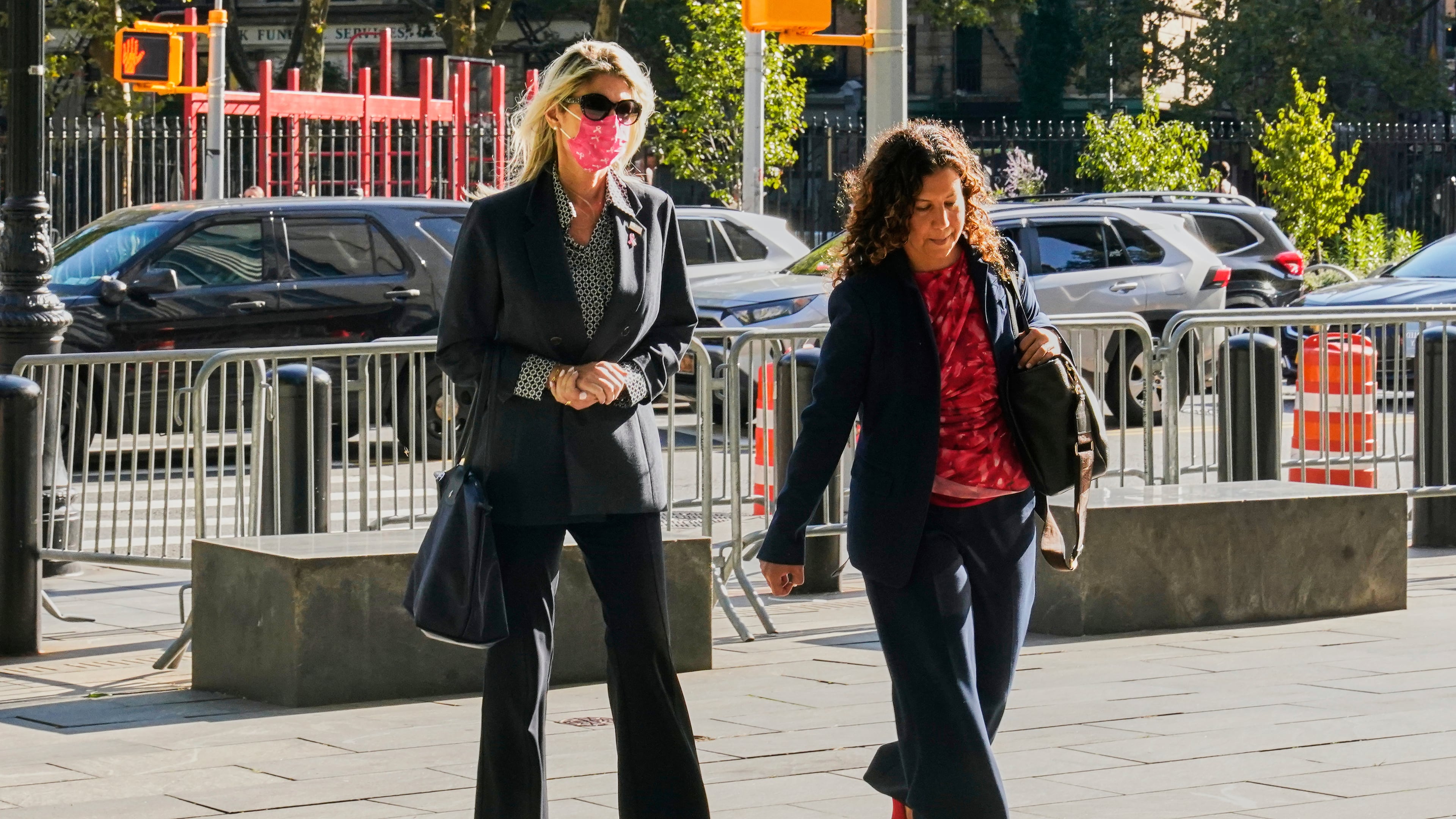 Nadine Menendez, left, wife of former Sen. Bob Menendez, D-N.J., arrives at Manhattan federal court, in New York, Thursday, Sept. 11, 2025. (AP Photo/Richard Drew)