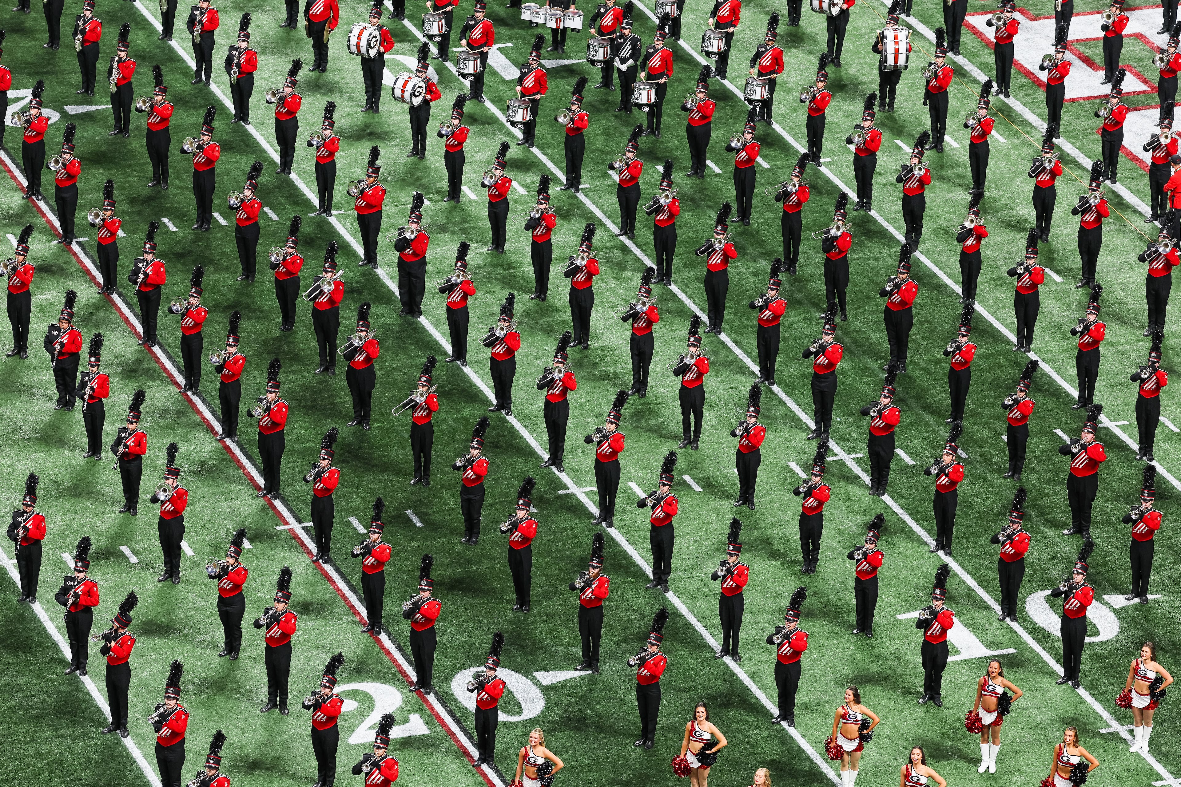 The Georgia marching band performs during the SEC Championship Game at Mercedes-Benz Stadium, Saturday, Dec. 6, 2025, in Atlanta. (Jason Getz / AJC)