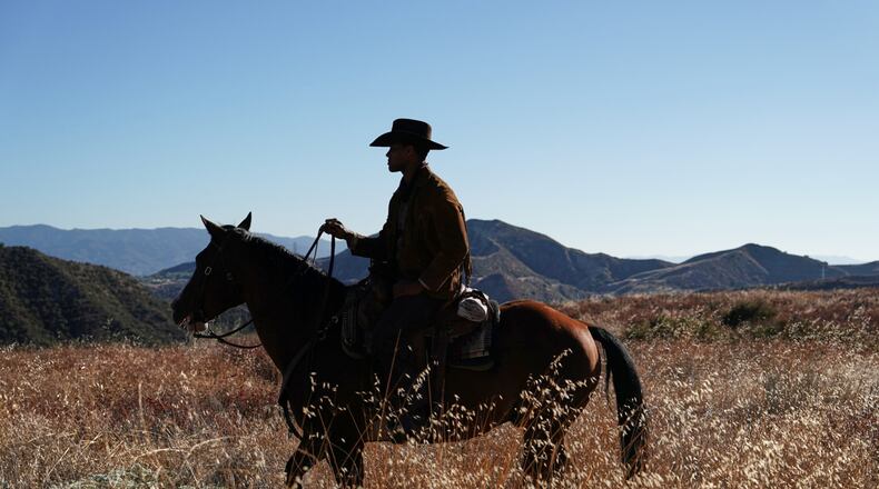 This image released by Peacock shows a scene from the documentary "High Horse: The Black Cowboy." (Troy Harvey/Peacock via AP)