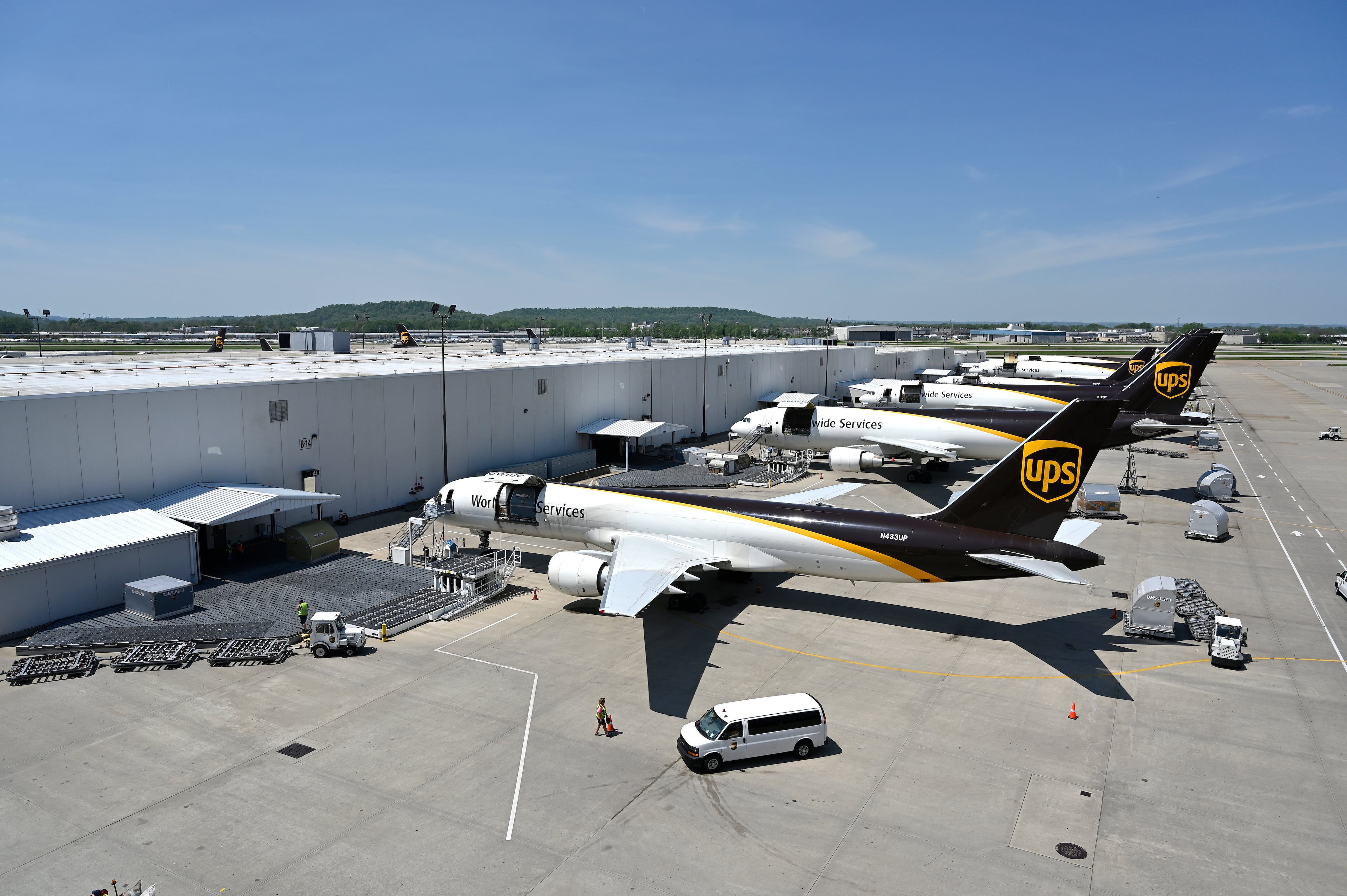 United Parcel Service transport jets wait to be loaded with packages at the UPS Worldport in Louisville, Ky., in 2021. (Timothy D. Easley/AP 2021)
