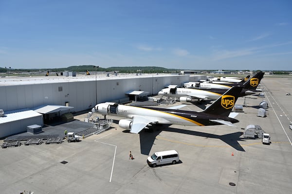 United Parcel Service transport jets wait to be loaded with packages at the UPS Worldport in Louisville, Ky., in 2021. (Timothy D. Easley/AP 2021)