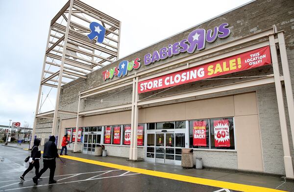 EMERYVILLE, CA - MARCH 15:  Customers enter a Toys R Us store on March 15, 2018 in Emeryville, California. Toys R Us filed for liquidation in a U.S. Bankruptcy court and plans to close 735 stores leaving 33,000 workers without employment.  (Photo by Justin Sullivan/Getty Images)