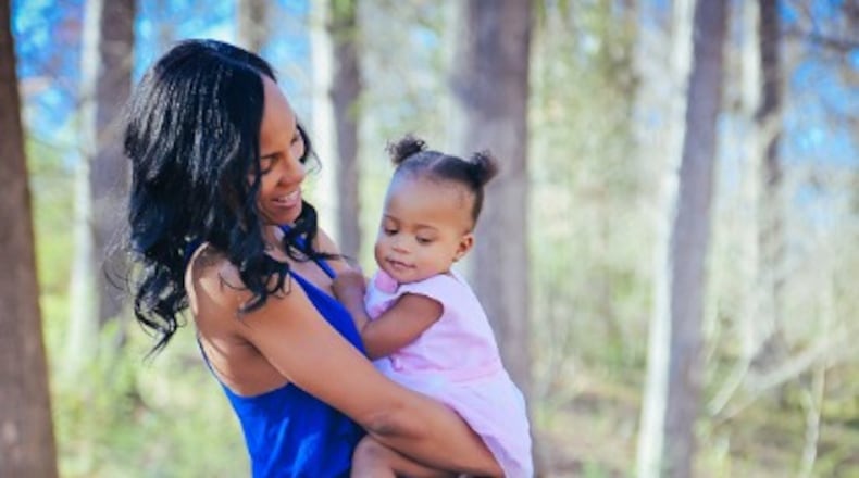 Tamika Fuller and Cai. Photo: Courtesy of Madame Noire.