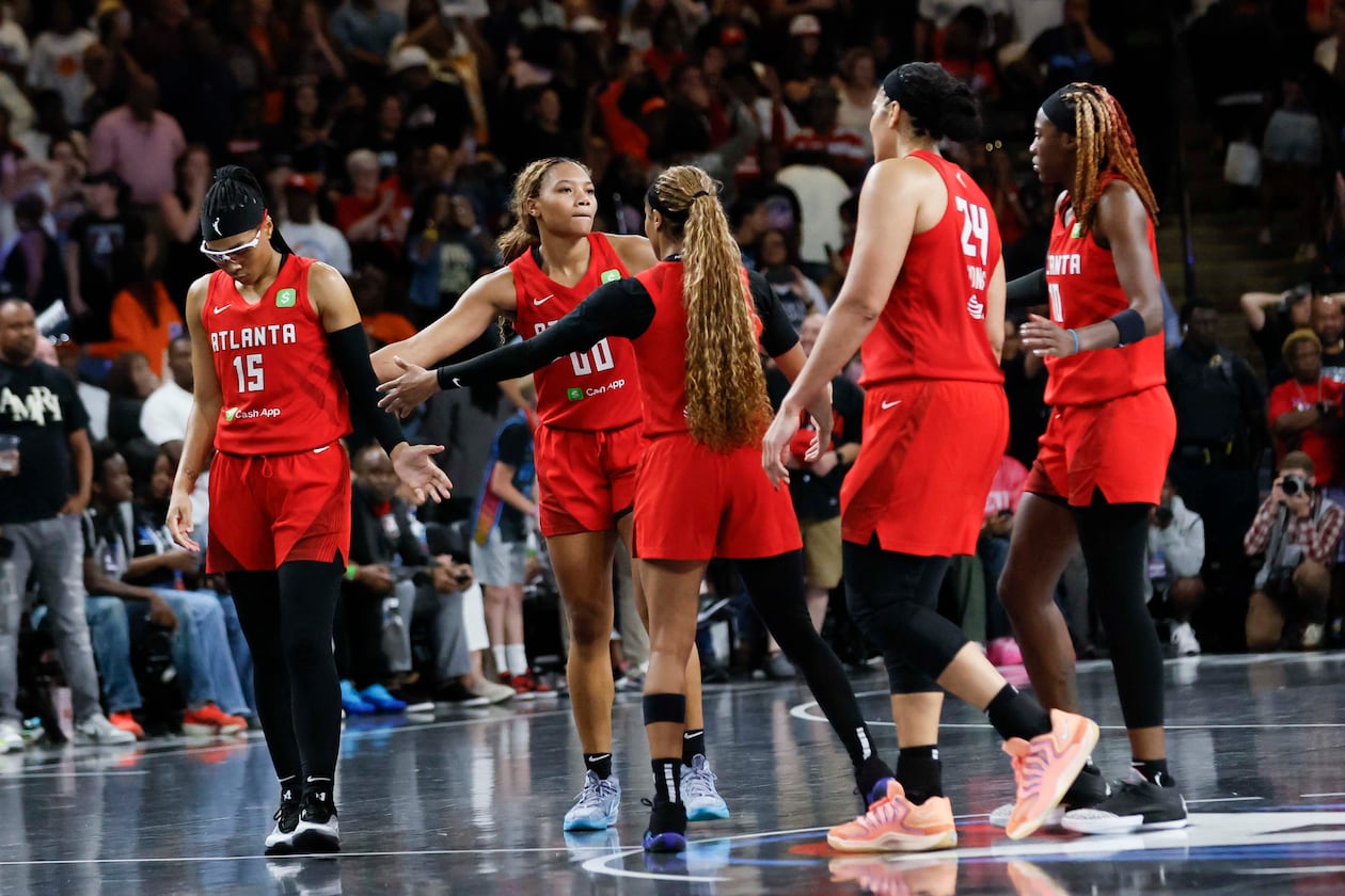 Atlanta Dream players gather on the center court after losing 87-85 in the first-round playoff game against the Indiana Fever at Gateway Center Arena on Thursday, Sept. 18, 2024, in Atlanta. 
(Miguel Martinez/ AJC)