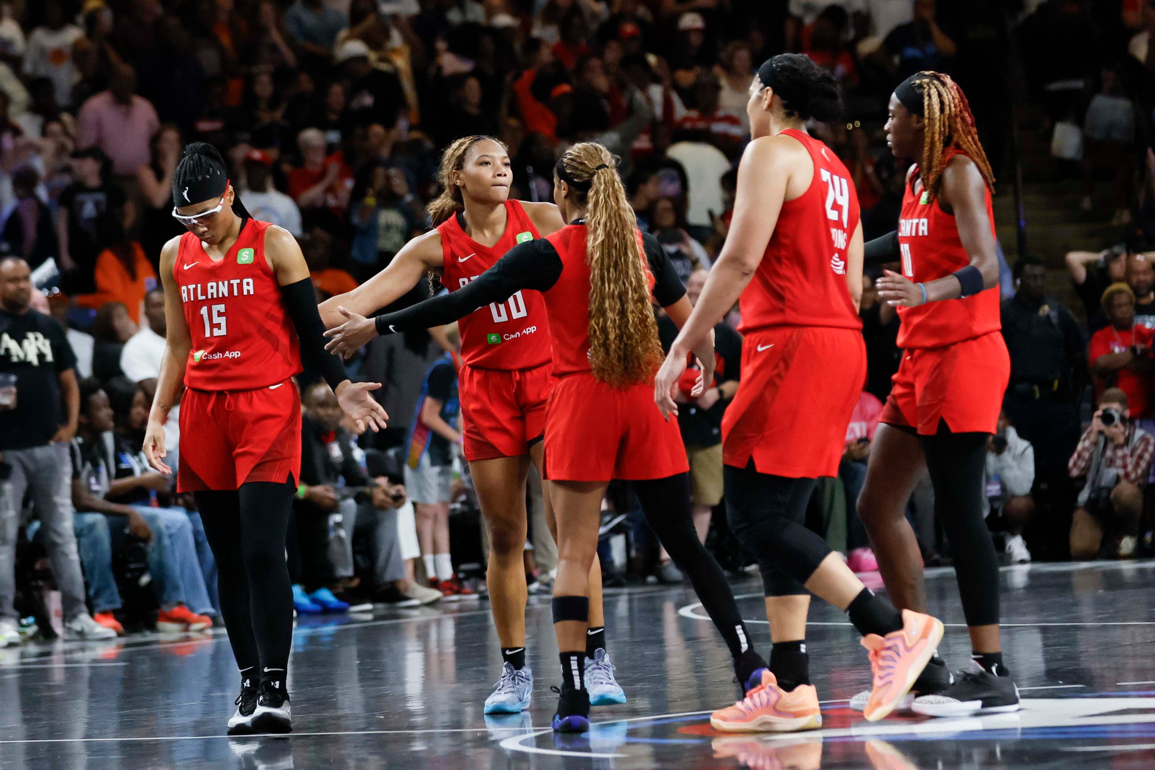 Atlanta Dream players gather on the center court after losing 87-85 in the first-round playoff game against the Indiana Fever at Gateway Center Arena on Thursday, Sept. 18, 2024, in Atlanta.
(Miguel Martinez/ AJC)