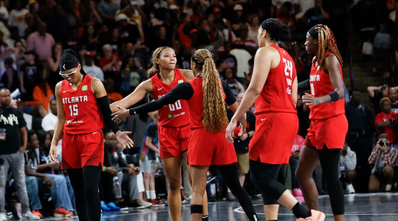 Dream players gather after losing 87-85 to the Indiana Fever in the first-round playoff game at Gateway Center Arena on Thursday, Sept. 18, 2024, in Atlanta. “Well, obviously, just a devastating ending to a great game,” coach Karl Smesko said. (Miguel Martinez/AJC)