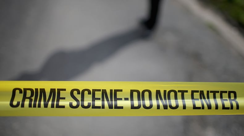 A woman told police she was attacked Saturday outside a Sandy Springs apartment complex.