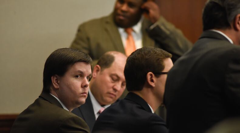 Justin Ross Harris sits with his defense team in the Glynn County Courthouse in Brunswick, Ga. after the verdict was delivered in his murder trial on Monday, Nov. 14, 2016. He was found guilty on all eight counts. (Photo by John Carrington / Special to the AJC)