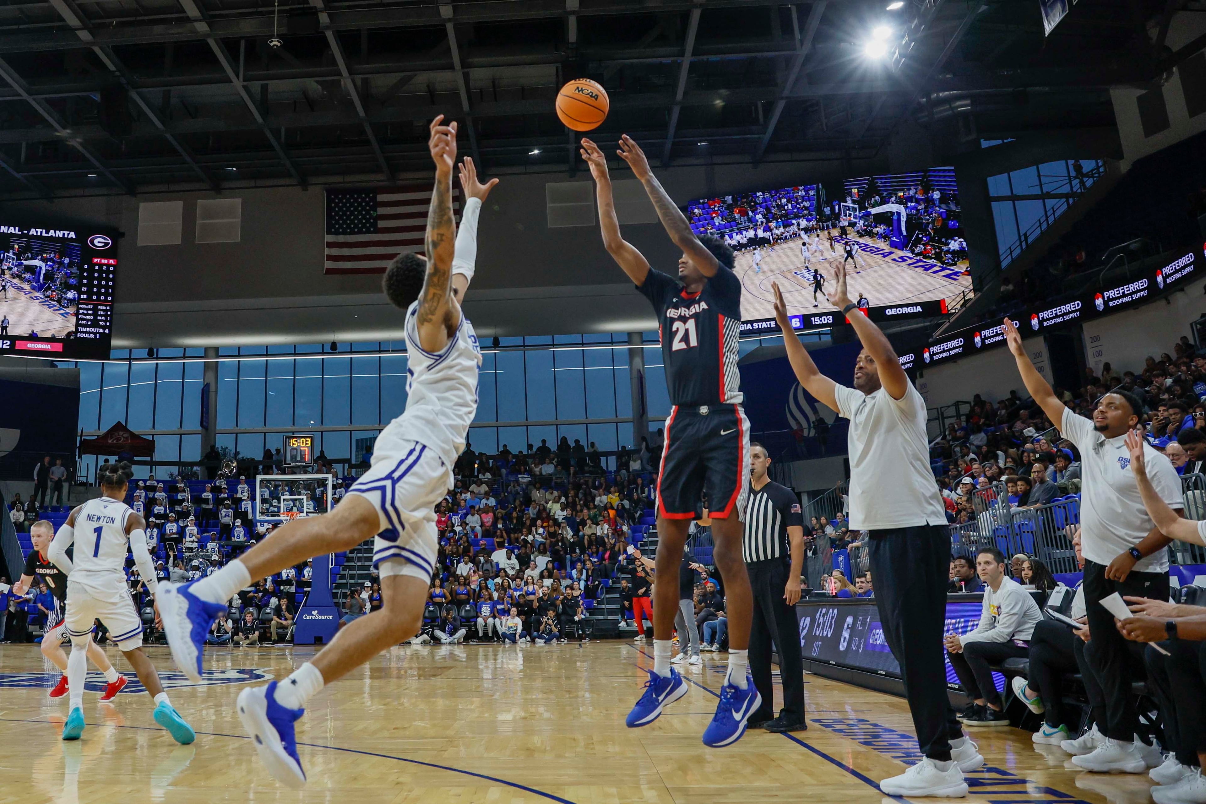 Georgia Bulldogs forward Jake Wilkins (21) attempts a three-pointer against Georgia State Panthers guard Jelani Hamilton (10) during the first half of an exhibition opener at the Georgia State Convocation Center on Wednesday, October 15, 2025, in Atlanta.
(Miguel Martinez/ AJC)